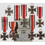 A Collection of Iron Cross 1939 II Class Eight examples each with black lacquered magnetic core in