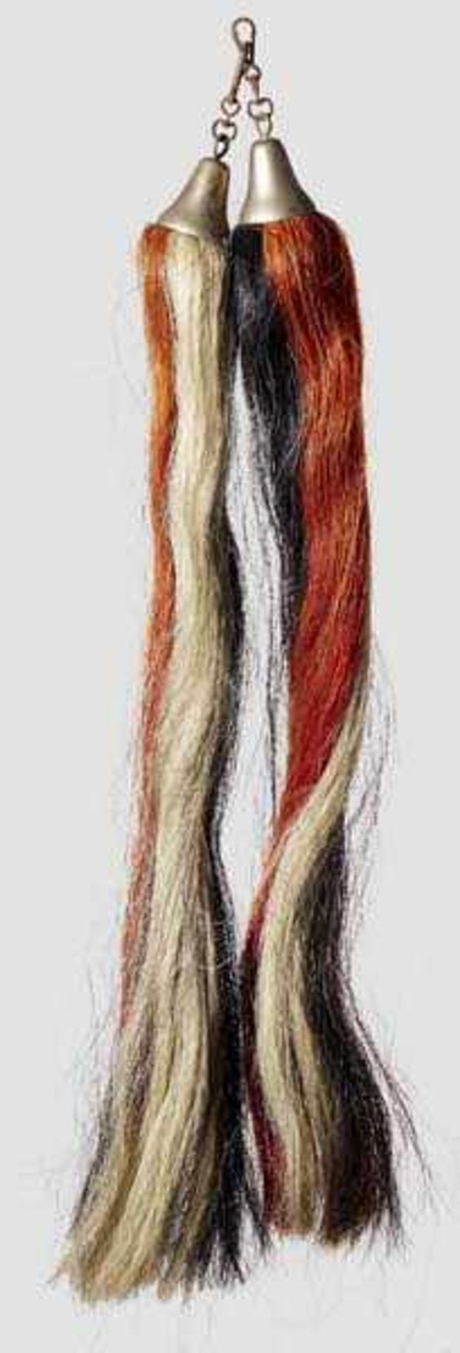 A pair of Schellenbaum tails Ca. 75 cm lengths of horse hair dyed in the national colours of