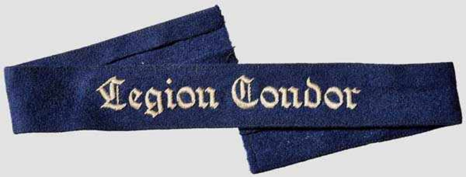 A Legion Condor Cuff Title Deep navy blue, doeskin wool construction, with machine-embroidered {