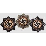 A Collection of three German Crosses – Cloth Issue Each with stamped and gilded wreath on branch