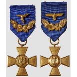 Two 40-year Wehrmacht Service Crosses 1st Class 25-Year Wehrmacht Long Service Medals constructed of