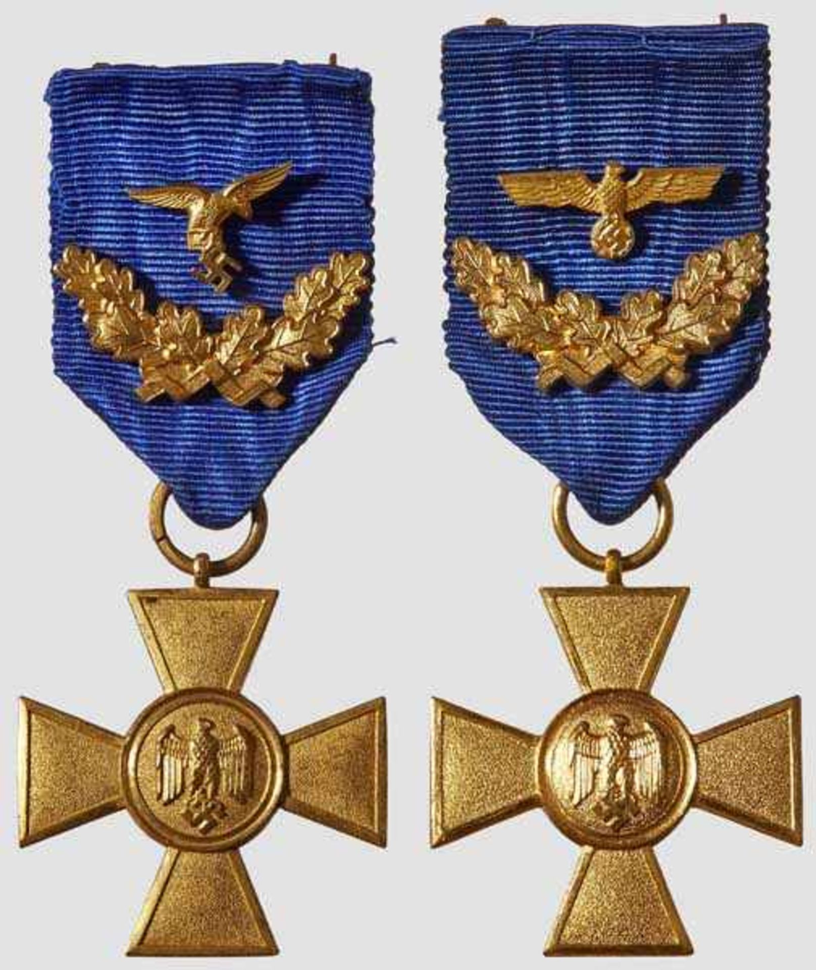 Two 40-year Wehrmacht Service Crosses 1st Class 25-Year Wehrmacht Long Service Medals constructed of