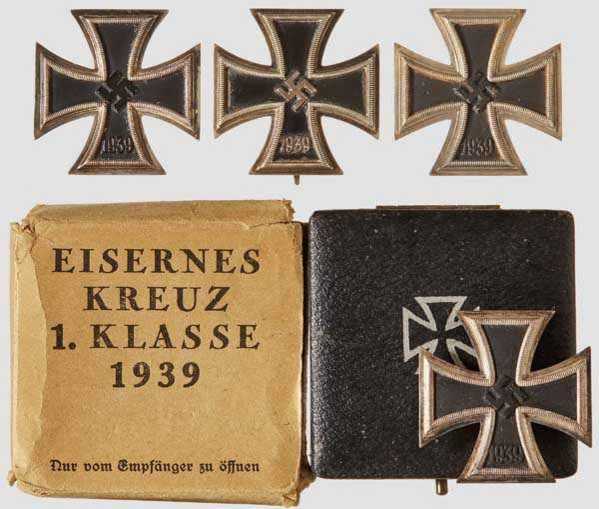 A Collection of Iron Crosses 1939 I Class Four examples each with black lacquered magnetic core in