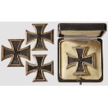 A Collection of Iron Crosses 1939 I Class Four examples two with black lacquered magnetic core,