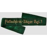 A Fallschirm-Jäger Rgt.1 Cuff Title Green wool, machine-embroidered white cotton script. Length