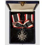 A Cased Knight's Cross of the War Merit Cross with Swords Silver, by Deschler, bottom arm stamped {