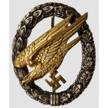 A Luftwaffe Paratrooper Badge Burnished silver wreath with riveted, gilded tombak eagle. Vertical