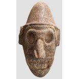 Maskaron aus vulkanischem Stein, Taino-Kultur, Karibik, 10.-15. Jhdt. Langovales Gesicht mit