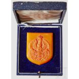 An Amber Königsberg Coat of Arms Non-portable award in matte finished amber with raised coat of