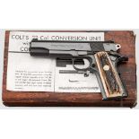 Colt Conversion, im Karton Kal. .22 l.r., Nr. 70L07603. Blanker Lauf, Länge 5". Zehnschüssig.