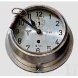 A Uboat clock Heavy metal casing with flange, three holes for wall attachment, closed back plate