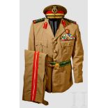 A Syrian Army Brigadier General Uniform Four pocket open collar tunic, tan colour lightweight cotton