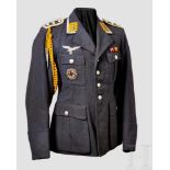 A Tunic for Oberfeldwebel and German Cross in Gold recipient Blue-grey wool four pocket tunic,