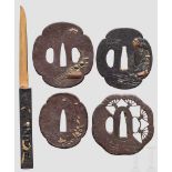 Vier Tsubas, Japan, 2. Hälfte Edo-Periode Eiserne Mokkogata-Tsubas, eine Tsuba mit Darstellung des