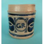 A tankard with GR monogram moulded medallion flanked by stylised foliage in blue, circa 1770,