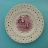 Napoleon and the Polka: a good nursery plate the floret moulded border enamelled in red and green,