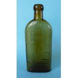 A Warner’s Safe Cure London medicine bottle in brown glass, 183mm