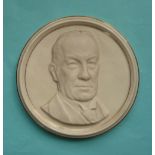 Stanley Baldwin MP: a Royal Worcester circular plaque moulded with a likeness after Richard Garbe,