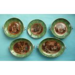 A part malachite bordered dessert service comprising: two varying oval comports, two circular