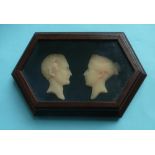 Victoria and Albert: a pair of wax profiles mounted in an hexagonal frame, circa 1840, 205mm wide