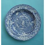 George III: a pearlware soup bowl by Davenport printed all over in blue with central profile and