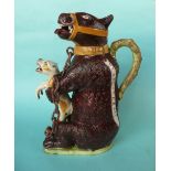 A rare and impressive Staffordshire pottery jug modelled as a chained bear with detachable head