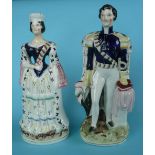 Victoria and Albert: a matched pair of Staffordshire pottery figures, 282mm, circa 1846, restored (