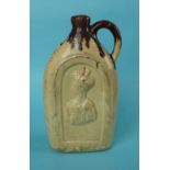 Victoria and Albert: a buff glazed pottery spirit flask moulded with portraits, circa 1840, 228mm (