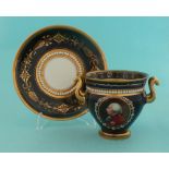 George III: a small twin handled cup and saucer by Flight Barr & Barr of Worcester, the deep blue