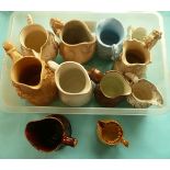 Eleven various moulded jugs and two printed depicting Walter Scott and Tennyson, some defects (