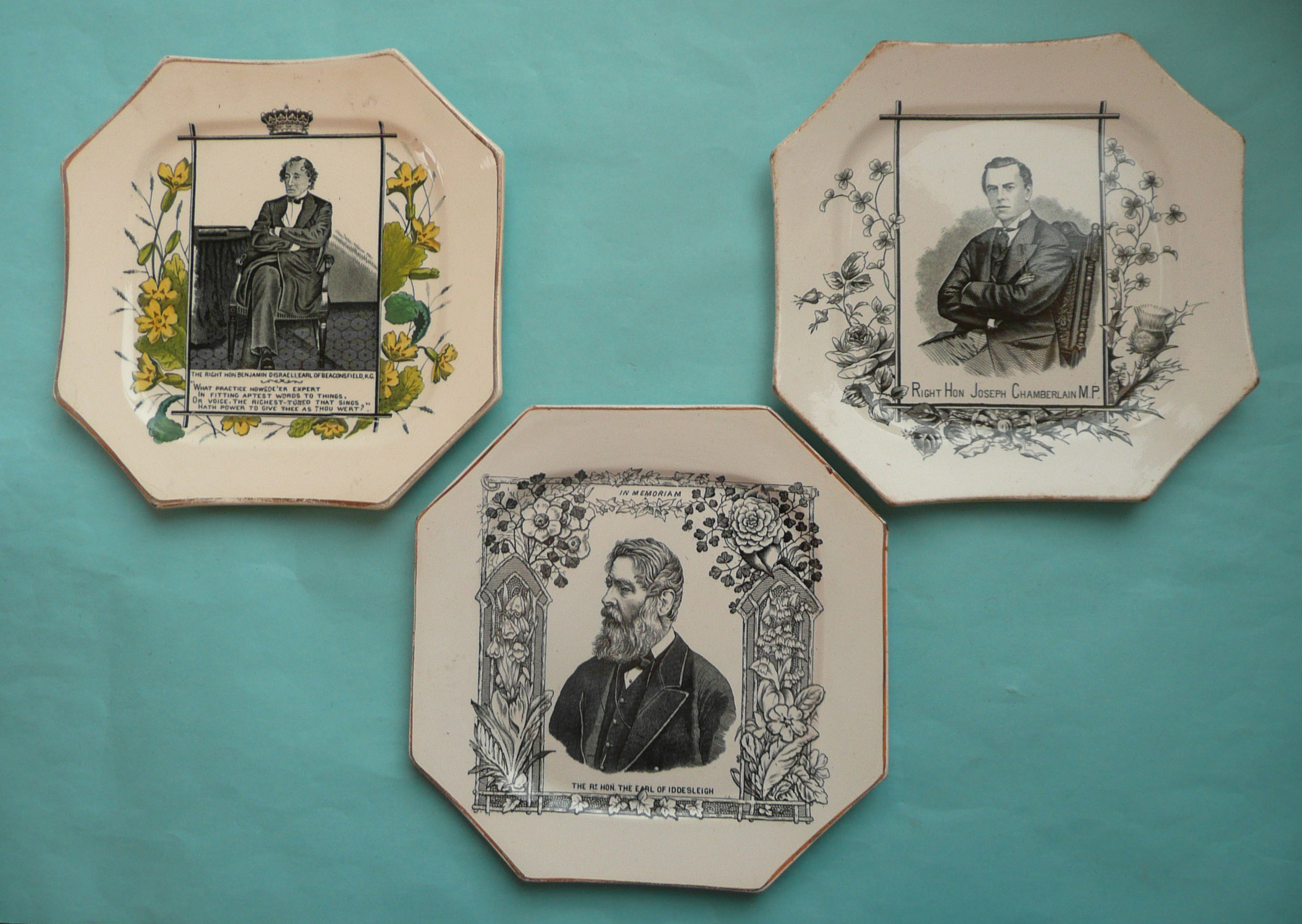 An octagonal plate depicting Disraeli, another Chamberlain and one other Iddseleigh (3) (