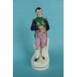 Napoleon Bonaparte: A good Staffordshire pottery figure depicted standing in uniform, circa 1850,