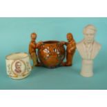 A small Paragon mug with gilt lion handle and named portrait of Chamberlain the Peacemaker, a