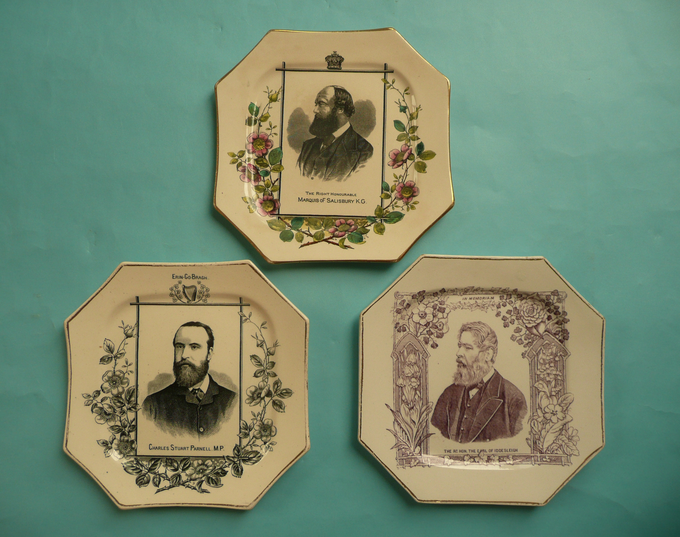 An octagonal pottery plate with named portrait of Salisbury, another Iddesleigh and one other of
