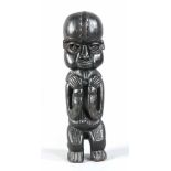 Afrikanische Skulptur, 2. H. 20. Jh., Holz, geschnitzt u. schwarz gefasst, vollplastische