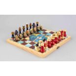 Schachspiel, Russland, um 2002, geschnitzte Holzfiguren, Schachbrett u. 32 Spielfiguren mit