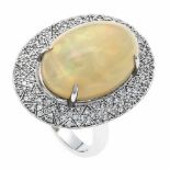 Opal-Brillant-Ring WG 750/000 mit einem exzellenten ovalen Milchopalcabochon 10,6 ct, 18 x13 mm, mit