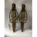 A PAIR OF VINTAGE WOODEN SNOW SHOES WITH COTTON BINDINGS, LENGTH OVERALL 75 CM, STAMPED L.