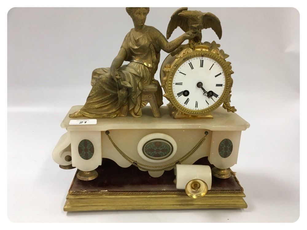 A FRENCH GILT METAL AND HARDSTONE MANTEL CLOCK IN THE FORM OF A SEATED CLASSICAL LADY WITH AN EAGLE