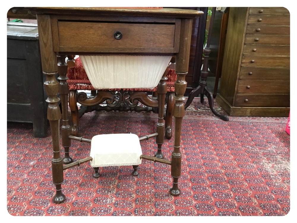 SMALL OAK WORK TABLE - BASKET SLIDES FORM THE SIDE,