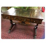 A REGENCY ROSEWOOD GAMES TABLE WITH CENTRAL SLIDING TOP ENCLOSING GAMES BOARD,