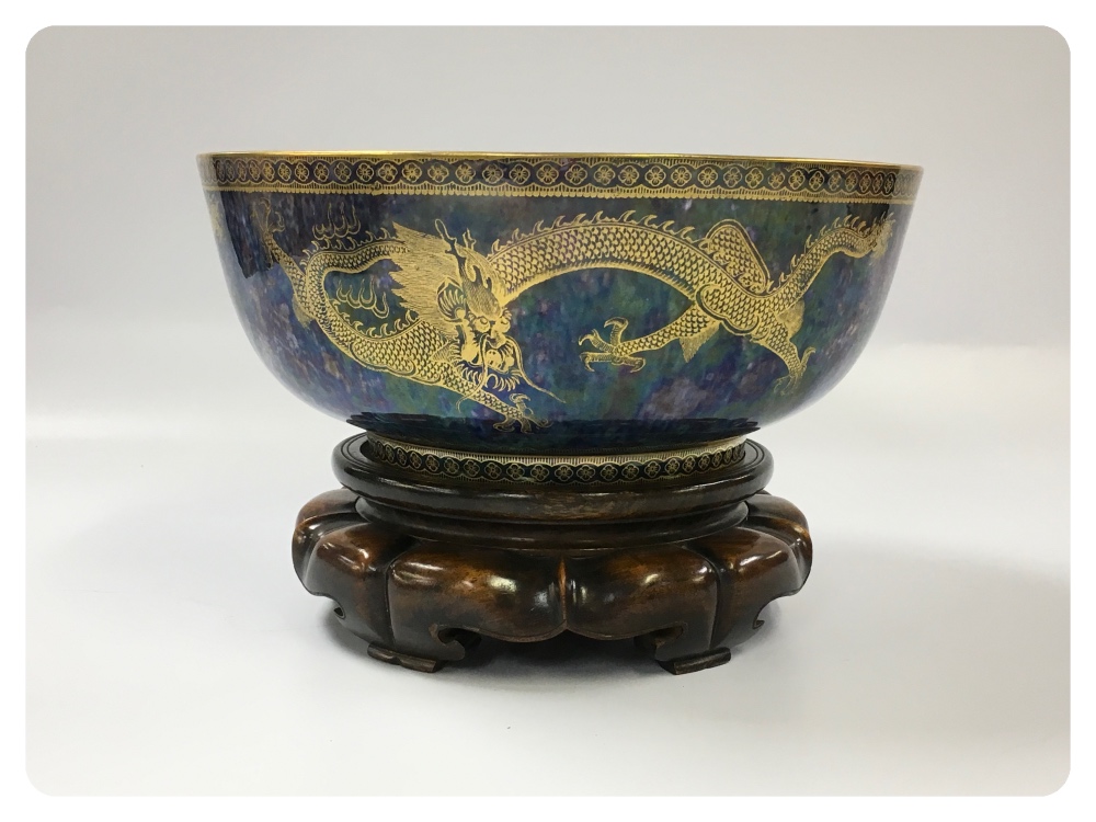 WEDGWOOD LUSTRE DRAGON DESIGN BOWL ON A CARVED HARDWOOD STAND 26CM. DIA.