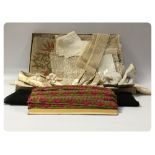 A BOX OF EARLY LACE WORK, TABLE MATS, HANDKERCHIEFS , DECORATIVE EDGING,