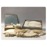 2 SMALL BOXES OF EARLY LACE WORK INCLUDING EDGING, BABIES/DOLLS VESTS, BONNETS, ETC.