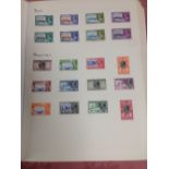 A COLLECTION ON PHILATELIC LEAVES, CAYMAN ISLANDS 1926 10/- OG, 1935 SET OG,