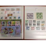 BOX WITH MAINLY QE2 MNH IN FOUR STOCKBOOKS AND BINDERS, SOME DEFINITIVE SETS,