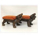 A VERY UNUSUAL C19TH. PAIR OF CARVED OAK FOOTSTOOLS IN THE FORM OF MYTHICAL ANIMALS 40CM. LONG 25CM.