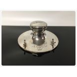 A SILVER CAPSTAN INKSTAND ENGRAVED DR. SPENCER 31/12/08 BIRMINGHAM 1907 13.5CM DIA.