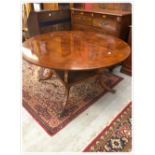 A CIRCULAR REPRODUCTION DINING TABLE DETAILED OYSTER VENEERED CHERRYWOOD TOP 147CM DIAMETER