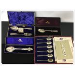 A SET OF SILVER COFFEE SPOONS,